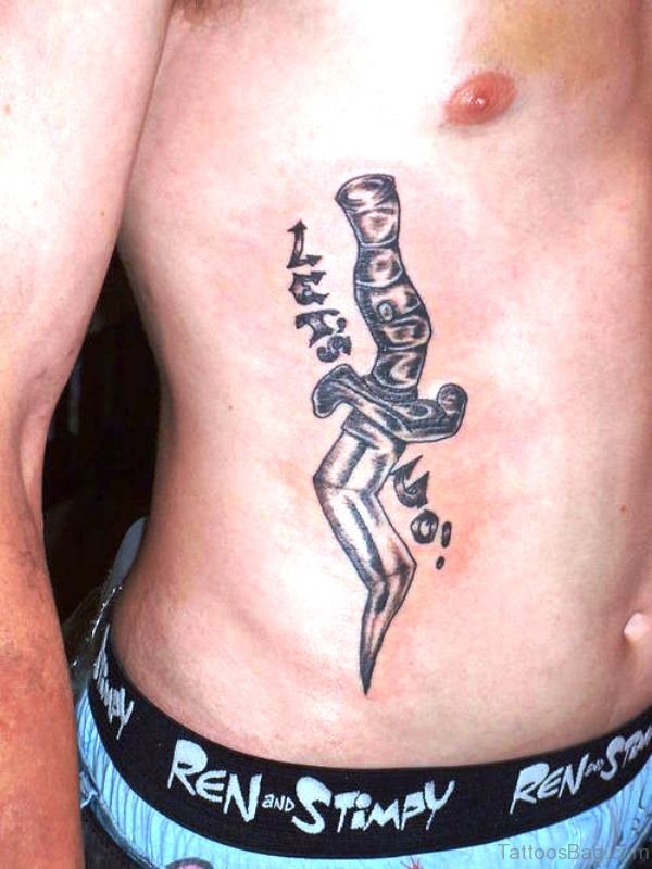 Beautiful Dagger Tattoo On Stomach