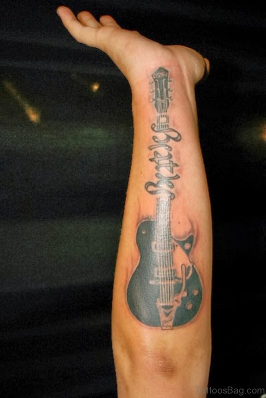 Beautiful Guitar Wrist Tattoo