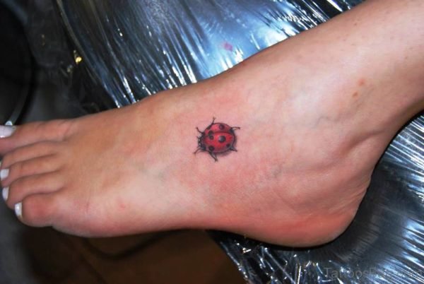 Beautiful Ladybug Tattoo On Foot 
