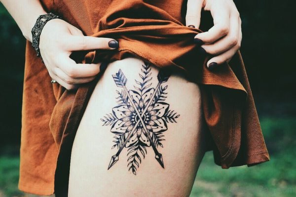 Beautiful Native Mandala Flower Tattoo On Girl Thigh
