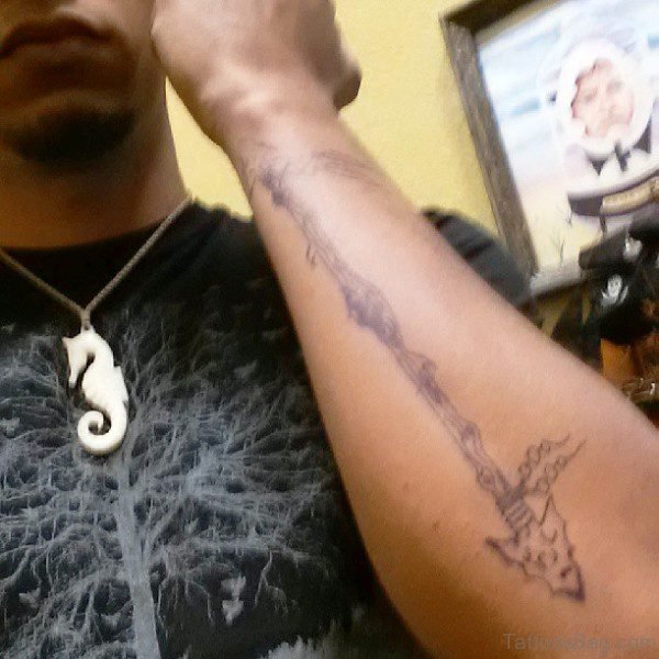 Big Black Arrow Tattoo On Arm