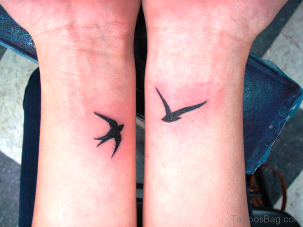 Birds Tattoos On Both Wrist Image