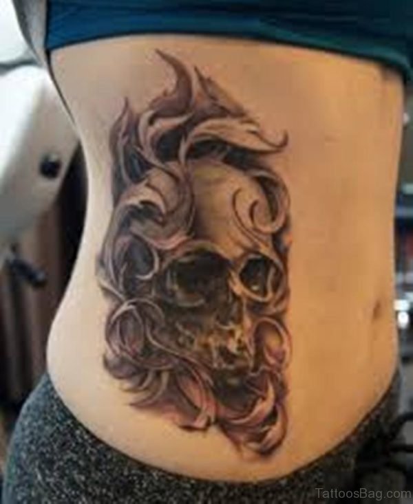 Black And Grey Skulls Tattoo