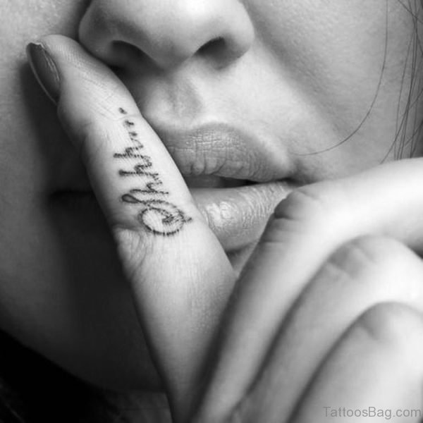 Black And White Shhh Tattoo On Finger