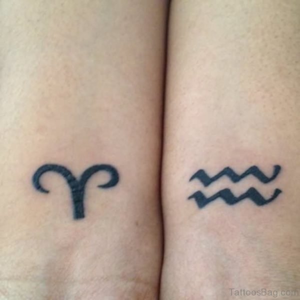 Black Aries And Cute Aquarius Tattoo
