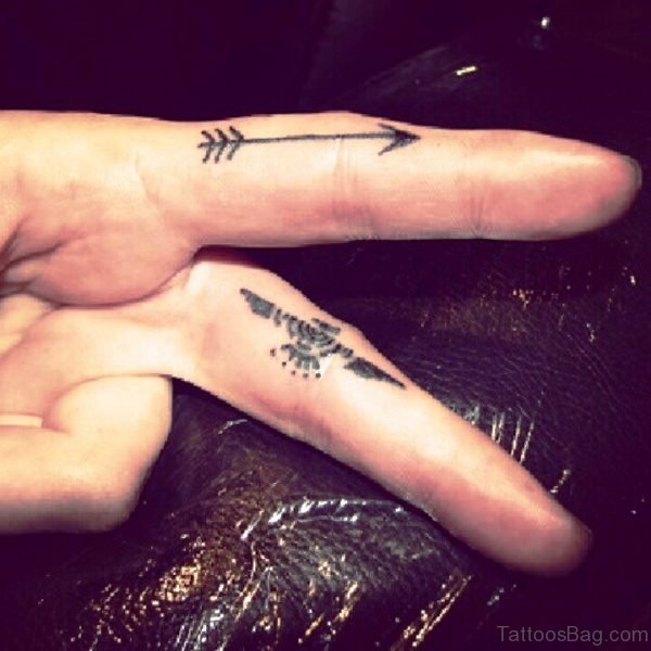 Black Arrow Tattoo On Finger