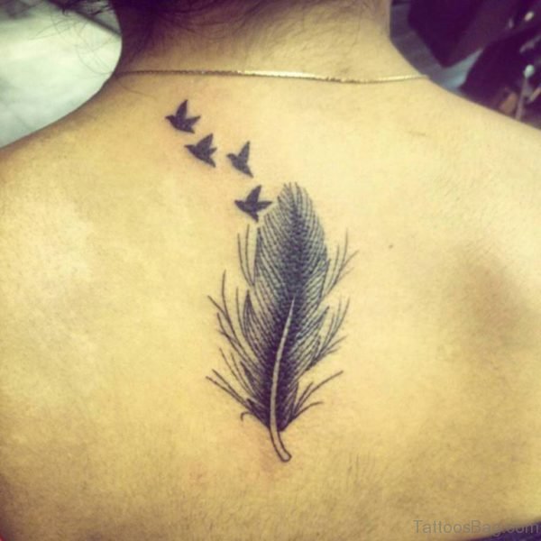Black Birds And Feather Tattoo On Back