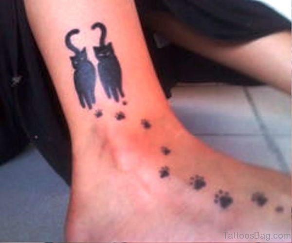 Black Cat Paws Tattoo On Foot