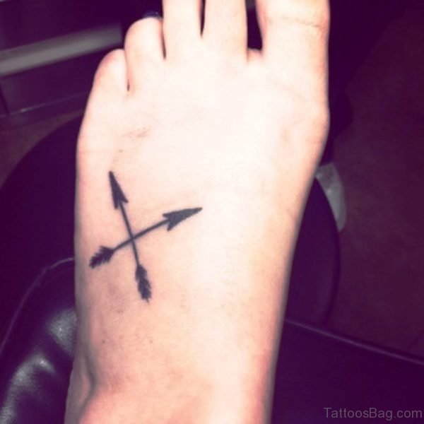 Black Cross Arrow Tattoo On Foot