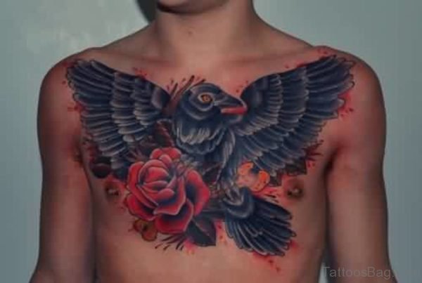 Black Crow With Red Rose Tattoo On Chest