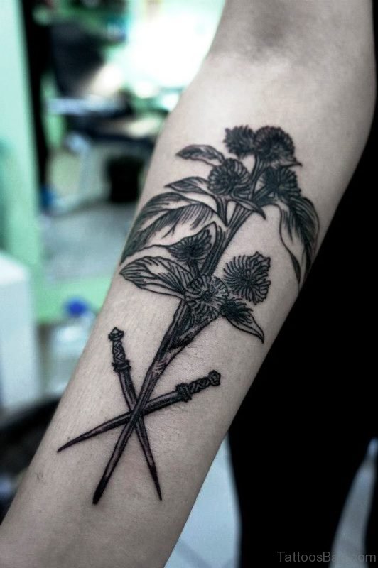 Black Flower With Cross Dagger Tattoo