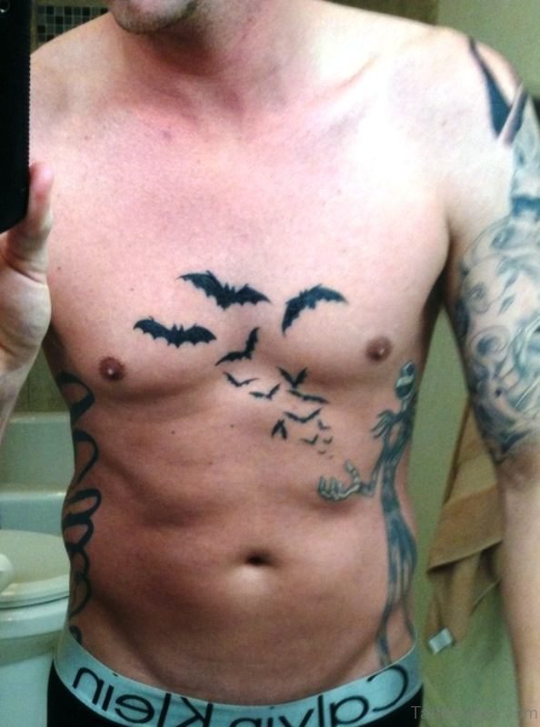 Black Flying Bats Tattoo On Chest