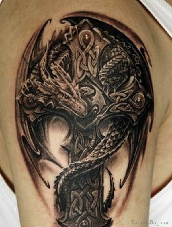 Black Ink 3D Celtic Cross With Dragon Tattoo Design For Shoulder