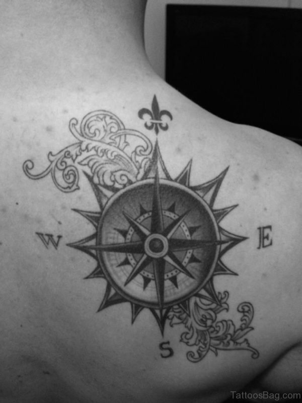Black Ink Compass Tattoo On Back