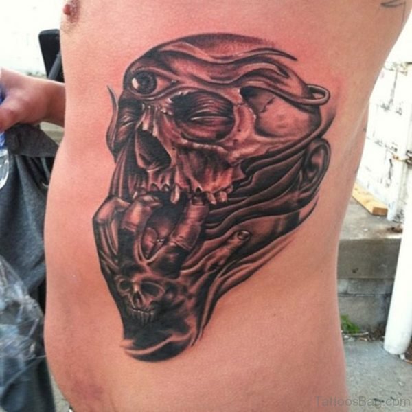 Black Ink Death Skull Tattoo Design For Side Rib