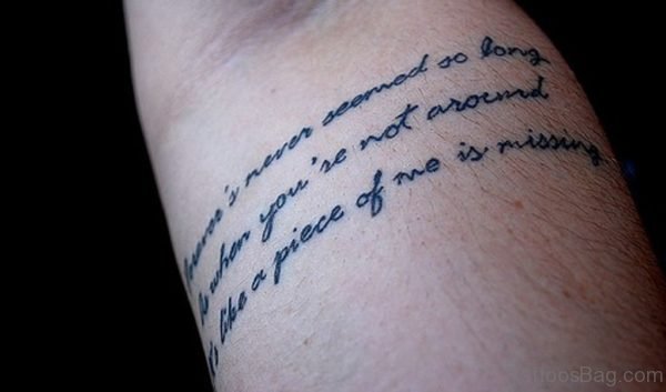 Black Ink Fantastic Wording Tattoo On Arm