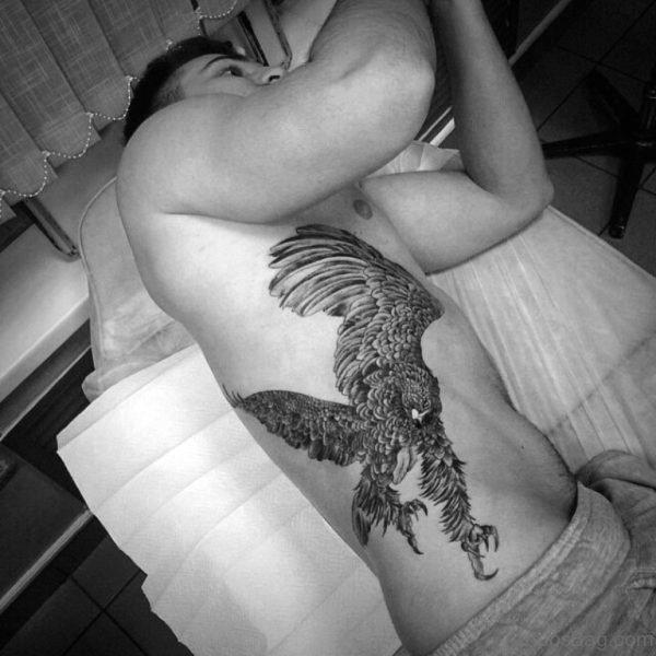 Black Inked Eagle Tattoo On Rib