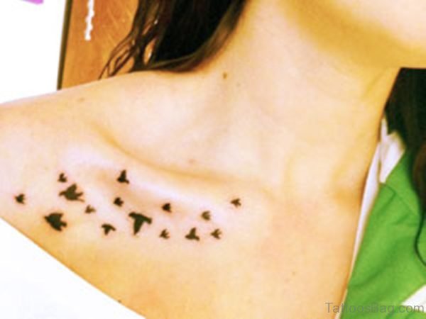 Black Little Flying Birds Tattoo On Girl Right Collar Bone