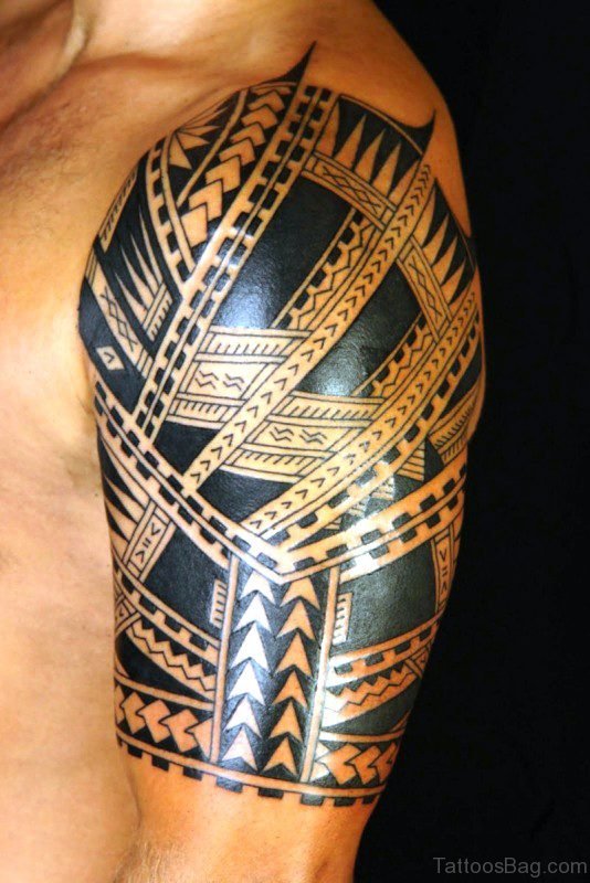 Black Maori Tattoo Design On Left Shoulder 