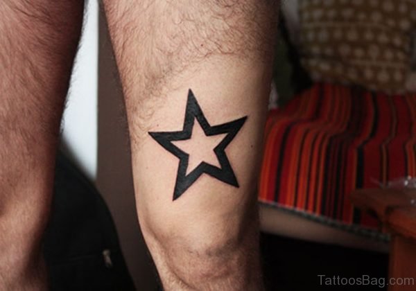 Black Star Tattoo On Leg
