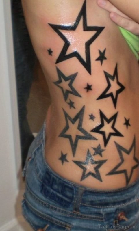 Black Stars Tattoo On Rib