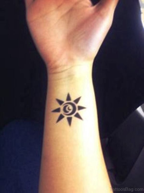 Black Sun Tattoo On Wrist 