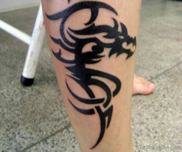 Black Tribal Dragon Tattoo On Right Leg 