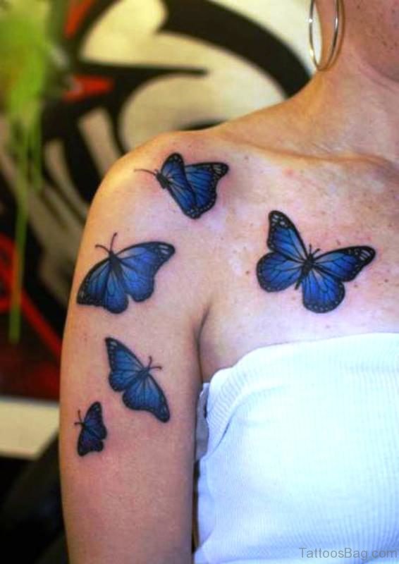 Blue Butterfly Tattoo On Right Shoulder