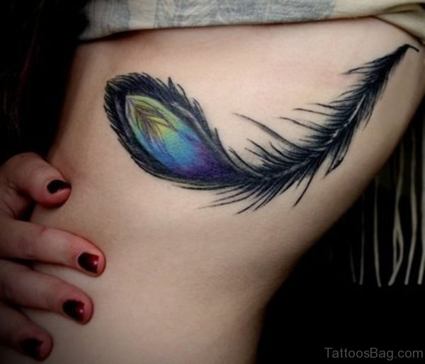 Blue Ink Feather Tattoo