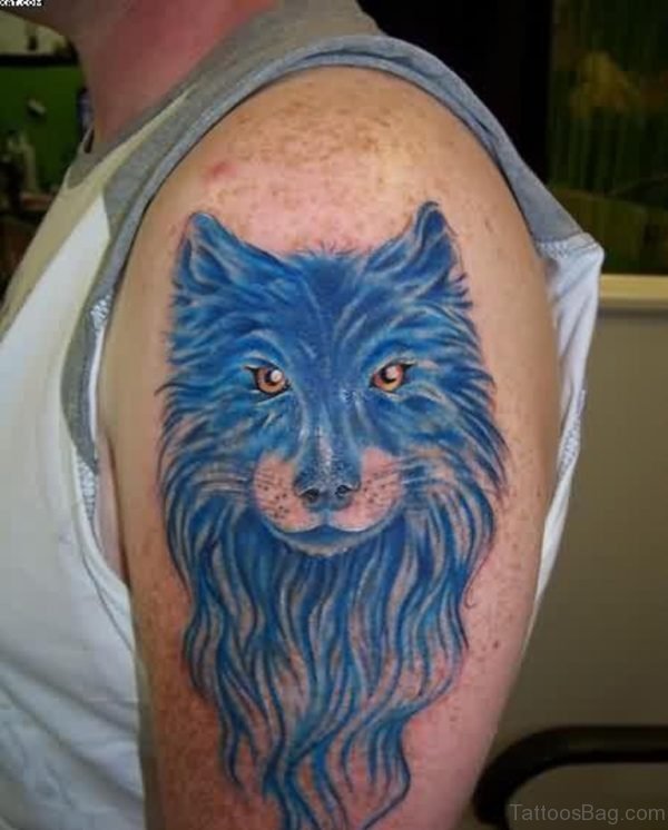 Blue Ink Wolf Tattoo On Shoulder