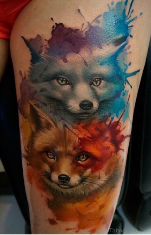 Blue Red Watercolor Foxes Tattoo on Thigh