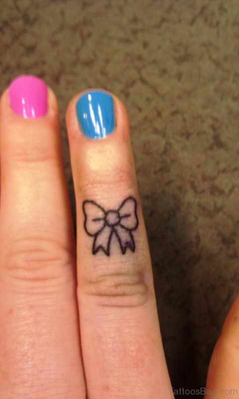 Bow Finger Tattoo