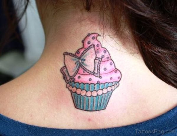 Bow With Cup Cake Tattoo On Neck