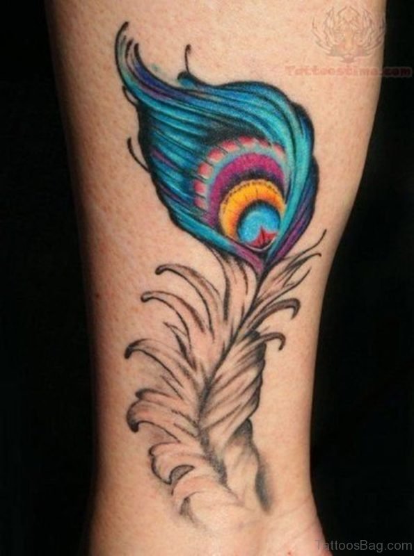 Bright Peacock Feather Wrist Tattoo