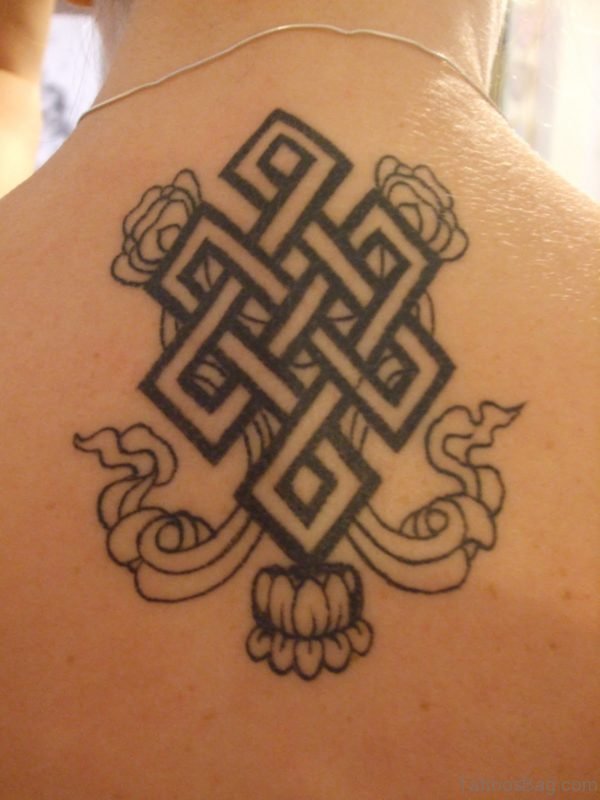 Buddhist Symbol Tattoos On Upper Back