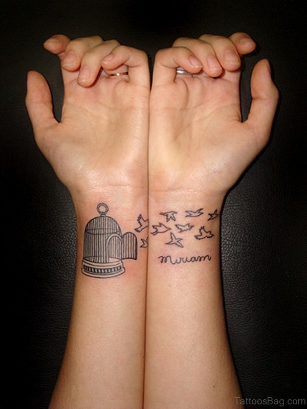 Cage With Bird Tattoo On Wrist
