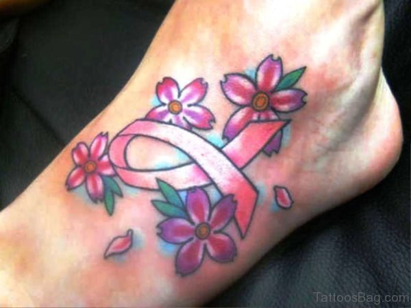 Cancer Ribbon Tattoo With Flowers