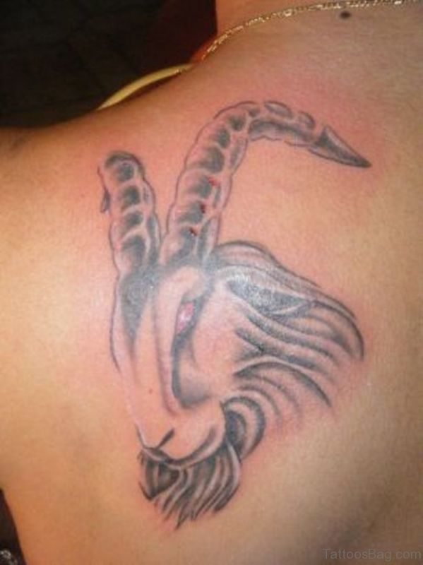 Capricon Tattoo On Left Shoulder