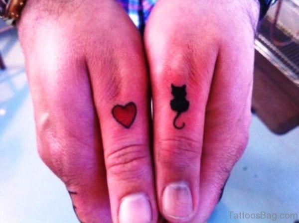 Cat And Heart Tattoo On Thumb