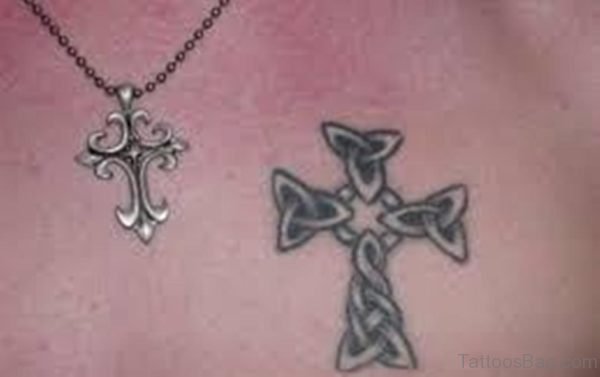 Celtic knot cross tattoo chest