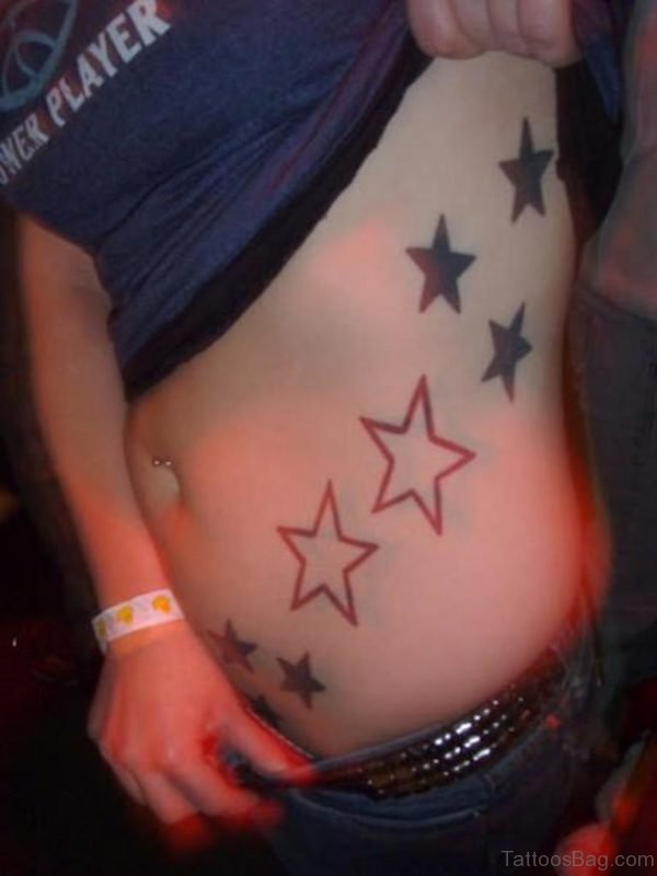 Classy Star Tattoo On RIb