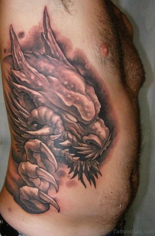 Clawing Dragon Tattoo On Rib