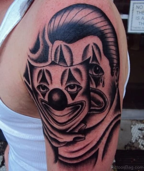 Clown Mask Tattoo On Left Shoulder