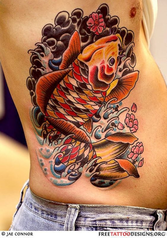 Colored Fish Tattoo On Rib