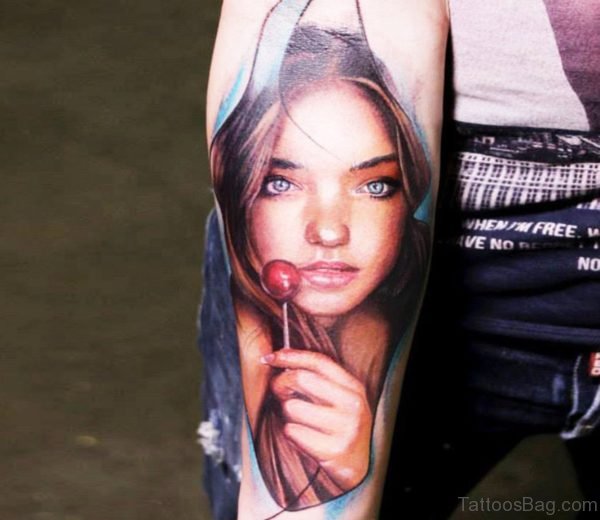 Colored Girl Portrait Tattoo On Arm 