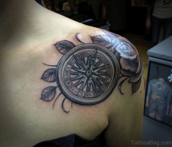 Compass And Rose Tattoo On Chest