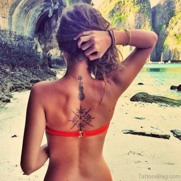 Compass Tattoo on Womans Back