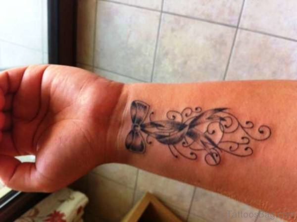 Cool Bow Tattoo On Wrist