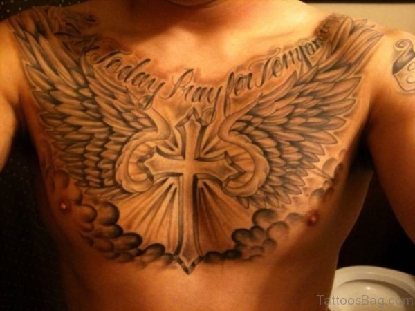 Cool Cross With Wings And Clouds Tattoo On Man Chest