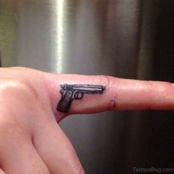 Cool Gun Tattoo On Finger